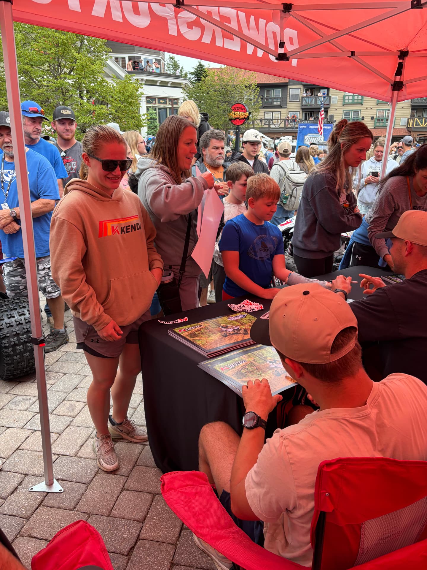 Fans at a race-weekend autograph signing